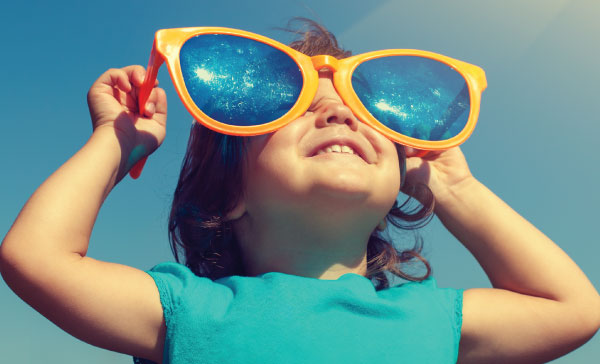 child with big sunglasses